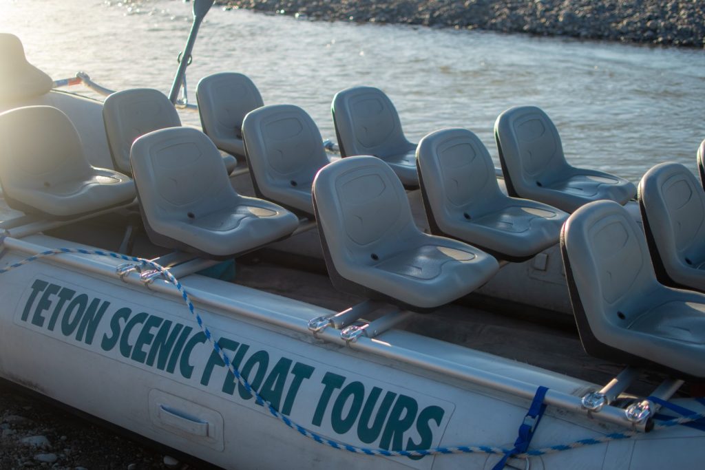 a custom raft with chairs built on for a float trip in jackson wy